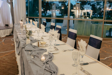 a dining room set up with banquet tables and chairs, which are made up of