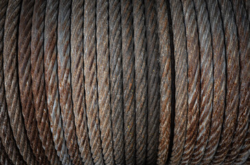 old and vintage iron cable on spool .