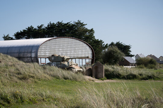 M4 Sherman tank peeking out of the hills at Utah Beach Museum