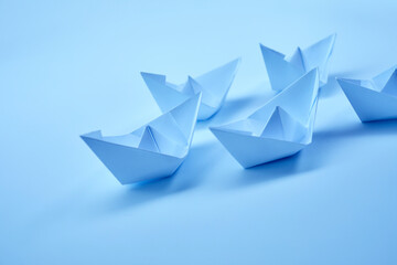 paper boats on the white