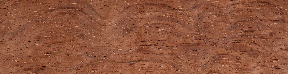 Bubinga pommele veneer with undulating grain patterns and warm terracotta tones