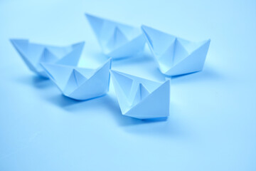 paper boats on the white