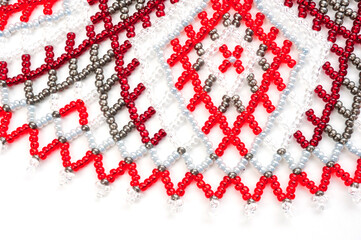 Women's necklaces made of multi-colored beads with Ukrainian national patterns.