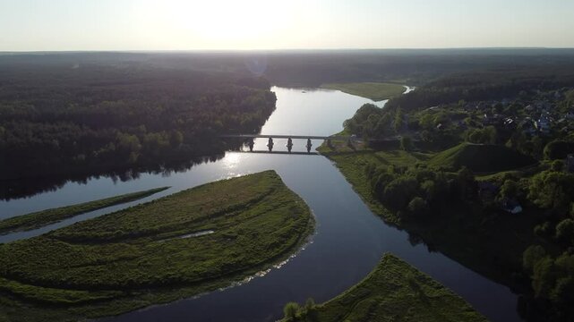 Aerial drone shot captures the merging of the Nemunas and Merkys rivers near the town of Merkine