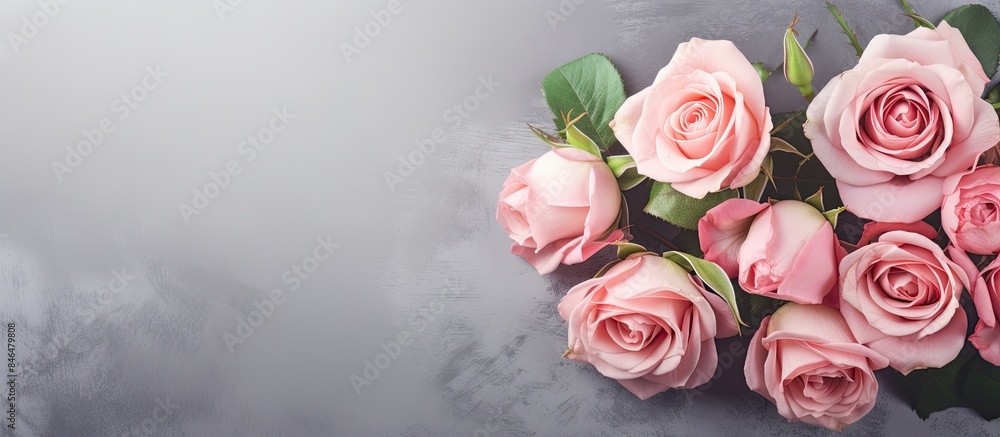 Poster floral background image with copy space featuring a bouquet of pink roses arranged in a floral frame