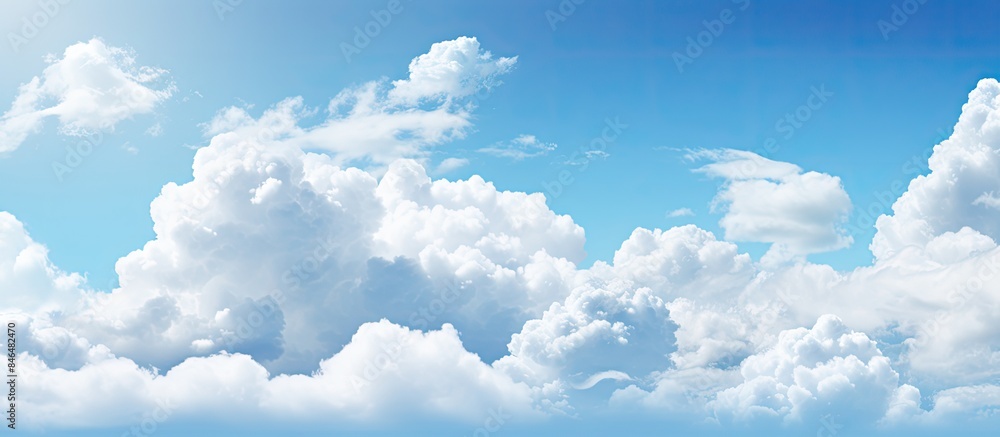 Poster copy space image of a background featuring blue sky and clouds