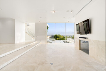 Spacious room with mountain views through windows