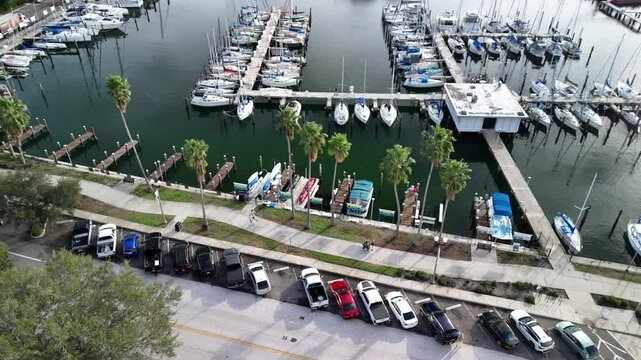 Drone footage over the Parrot Cove Marina with moored boats in Bradenton, FL, United States