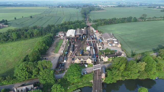 Nene Valley Railway in Peterborough surrounded by green fields and the river Nene in England