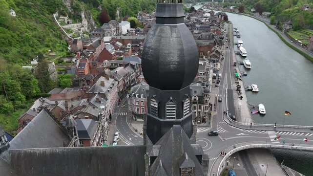 Drone footage of the bell tower of Notre Dame de Dinant Church in Dinant, Belgium