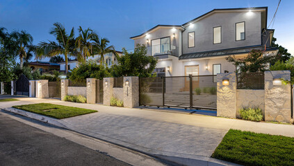 House with a beautiful garden and metal gates. California, USA