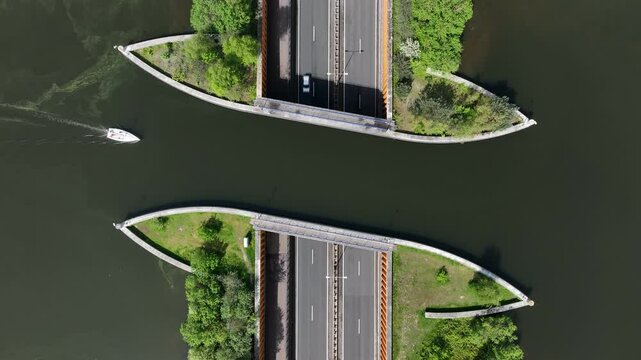 Aerial footage of Veluwemeer Aqueduct located over Veluwemeer lake in Harderwijk, Netherlands