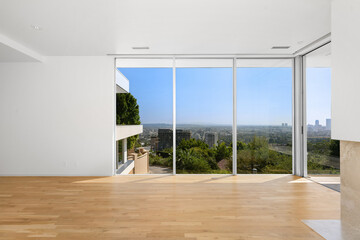 City view through window in room with fireplace