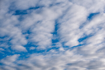 Obraz premium pattern blue day sky with white clouds