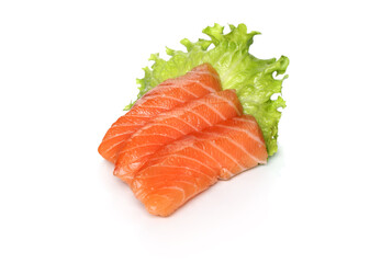 Salmon slices on a green lettuce leaf on a white background