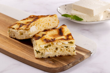 Delicious Turkish food; Tray pastry; (Turkish name; Su boregi)