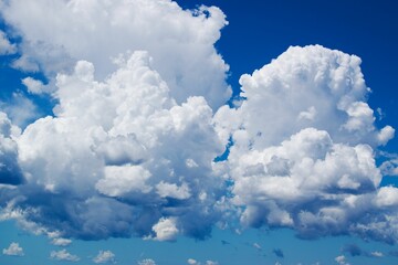 White clouds against a deep blue sky