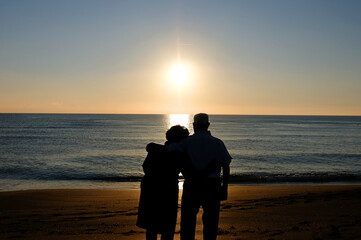 Elderly couple at sunset