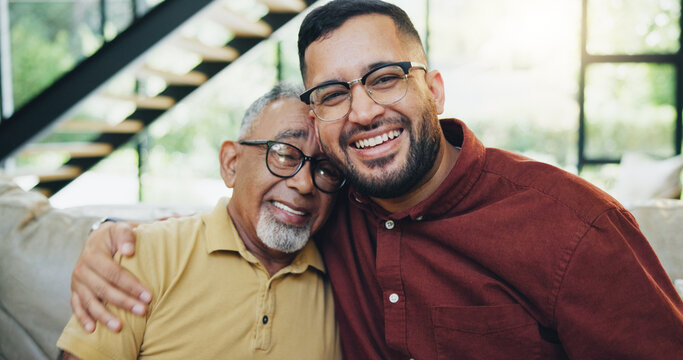 Smile, hug and man with senior father on sofa relaxing together for fathers day celebration. Happy, love and portrait of elderly male person embracing son for care and bonding in living room at home. - Powered by Adobe