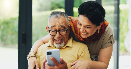 Phone, hug and senior couple in home reading online blog together for news on election campaign....