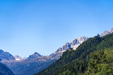 Fototapeta premium Scenic view of mountain Valley Bedretto in the Swiss Alps with mountain peak on a sunny late summer day. Photo taken September 10th, 2023, Gotthard, Canton Ticino, Switzerland.