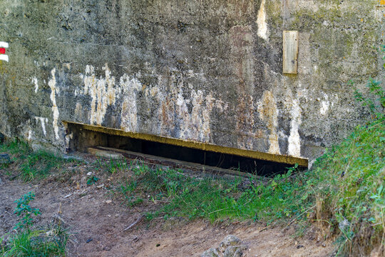 Artillery bunker fortification at hiking trail at Swiss mountain pass St. Gotthard on a sunny summer day. Photo taken September 10th, 2023, Gotthard Pass, Switzerland.