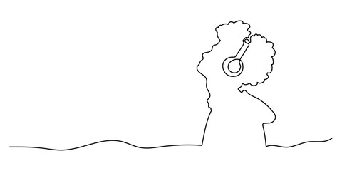 Man with headphones one line on a white background. One line continuous music banner concept. Vector illustration.