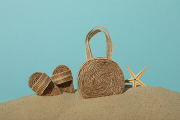 Miniature summer things for relaxing on the beach, near the sea.