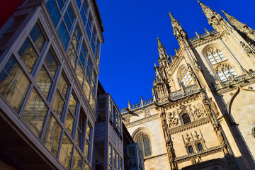 Burgos cathedral and reflection in typical glass loggia, Spain