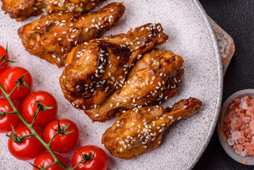 Delicious crispy grilled wings with teriyaki sauce with salt, spices