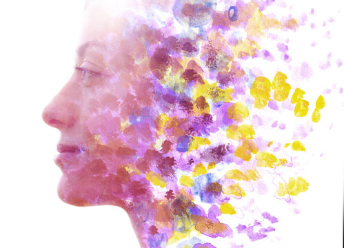 An abstract paint splash paintography profile portrait of a woman