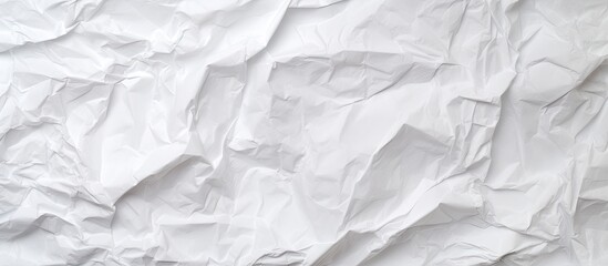 White crumpled paper texture perfect for design with ample copy space image.