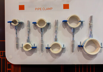 A set of clamps for pipes of different diameters.