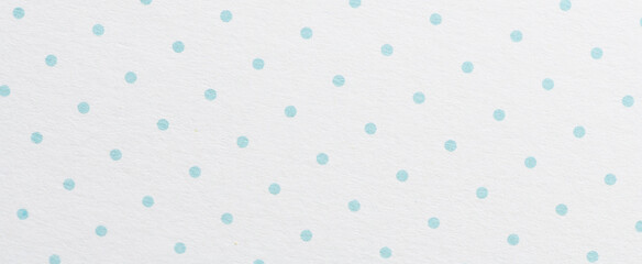 Blue polka dot paper as background or texture.