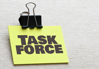 Task Force words on a small piece of paper.