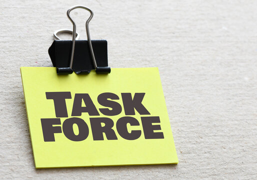 Task Force words on a small piece of paper.