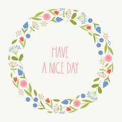 Floral greeting card with colorful meadow flowers. Circle frame