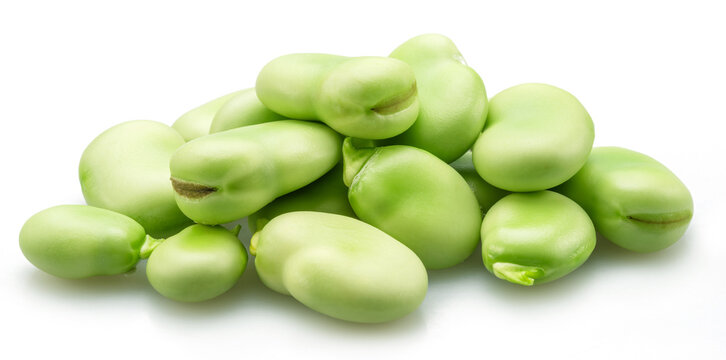 Pile of green young broad beans isolated on white background.