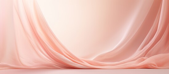 Soft peachy pink gradient backdrop with blurred lines and elegant drapery creating a vintage feel perfect for occasions like Mother's Day or a baby's birthday, with copy space image.