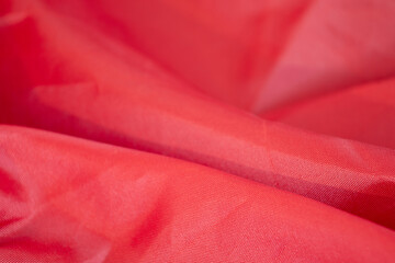 red canvas background, textile material damask texture pattern. Choose specific focus point
