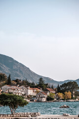 Obraz premium Historic town of Perast at Bay of Kotor in summer, Montenegro,Perast on a sunny day, Montenegro. Travel to Montenegro concept.Scenic panorama view of the historic town of Perast at famous Bay of Kotor