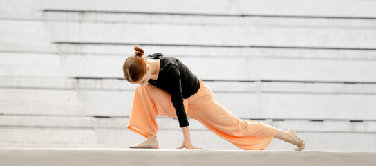 Teenage Girl Performs Contemporary Dance On Stage