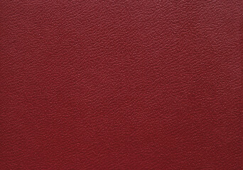 Maroon color grainy fine leather texture as background	
