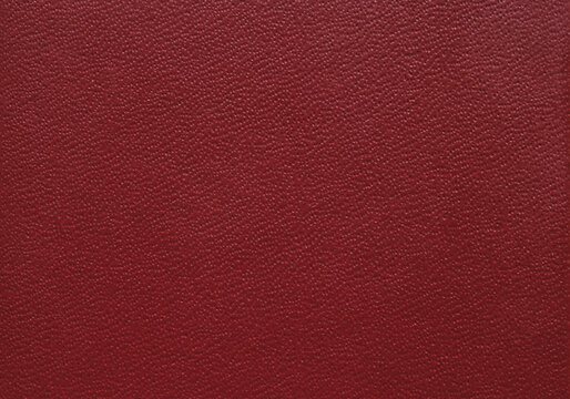 Maroon color grainy fine leather texture as background
- Powered by Adobe
