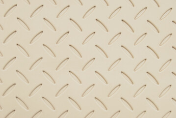 Beige rubber diamond tread mat texture background