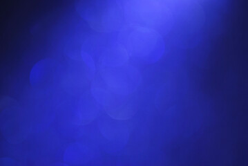 Purple abstract background with light bokeh effect