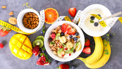 bowl of muesli with fresh fruits- health food concept