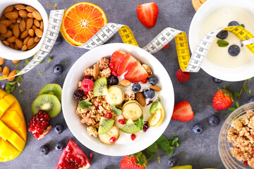 bowl of muesli with fresh fruits- health food concept