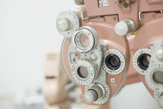 Closeup vintage pink optometer (phoropter)(Eyes exam equipment)