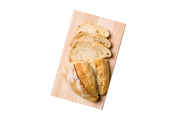 Freshly baked bread slices on cutting board isolated on white background . top view Sliced bread